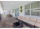 Relaxing patio with wicker furniture and view of the pool at 9076 Hazard St, Davenport, FL 33896