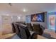 Home theater with four reclining seats and large screen at 9076 Hazard St, Davenport, FL 33896