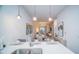 Open concept kitchen with island and dining area at 387 Famagusta Dr, Davenport, FL 33896
