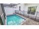 Enjoy your own private pool with safety fence, perfect for relaxing and entertaining at 387 Famagusta Dr, Davenport, FL 33896