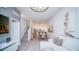 Open concept dining room and kitchen with modern appliances and breakfast bar at 387 Famagusta Dr, Davenport, FL 33896