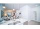 Modern kitchen with white cabinets and island at 387 Famagusta Dr, Davenport, FL 33896
