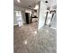 Modern kitchen with stainless steel appliances and tile floors at 520 Avenue L Se, Winter Haven, FL 33880
