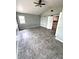 Spacious bedroom with tile floors and ceiling fan at 520 Avenue L Se, Winter Haven, FL 33880