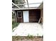Small back patio with concrete slab at 520 Avenue L Se, Winter Haven, FL 33880