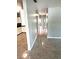 Bright hallway with tile floors connecting to other rooms at 520 Avenue L Se, Winter Haven, FL 33880