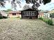 Large backyard with mature trees at 520 Avenue L Se, Winter Haven, FL 33880