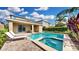 Private backyard oasis featuring a refreshing pool and spa at 601 Lasso Dr, Kissimmee, FL 34747