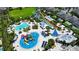 Aerial view of a vibrant water park with slides and pools at 601 Lasso Dr, Kissimmee, FL 34747