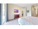 Bedroom with a dresser and a queen-size bed at 601 Lasso Dr, Kissimmee, FL 34747