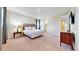 King-size bed, nightstand, and access to closet at 601 Lasso Dr, Kissimmee, FL 34747