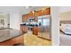 Well-equipped kitchen boasts stainless steel appliances and granite counters at 601 Lasso Dr, Kissimmee, FL 34747