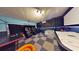 Game room with ping pong, air hockey, and arcade games at 601 Lasso Dr, Kissimmee, FL 34747