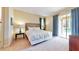 King-size bed, access to pool, and nightstands at 601 Lasso Dr, Kissimmee, FL 34747