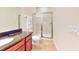 Bathroom with shower, toilet and double sinks at 601 Lasso Dr, Kissimmee, FL 34747