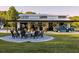 White barn with firepit and seating area in front at 4600 Nebraska Ave, Sanford, FL 32771