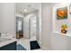 Bathroom with shower, toilet, and access to another room at 4600 Nebraska Ave, Sanford, FL 32771