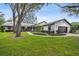 Charming single story home with a lush green lawn at 4600 Nebraska Ave, Sanford, FL 32771