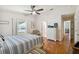 Bedroom with terracotta tile floors and a ceiling fan at 4600 Nebraska Ave, Sanford, FL 32771