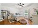 Bright bedroom with tiled floors and a ceiling fan at 4600 Nebraska Ave, Sanford, FL 32771