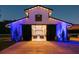 Barn exterior with stylish lighting at night at 4600 Nebraska Ave, Sanford, FL 32771