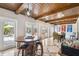 Casual dining area with a barrel-top table and pool view at 4600 Nebraska Ave, Sanford, FL 32771