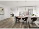 Modern kitchen with white cabinets and a large island with seating at 2663 Trafalgar Blvd, Kissimmee, FL 34758