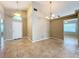 Open dining room with tile floors and access to entry at 466 Lancers Dr, Winter Springs, FL 32708