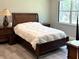 Bright bedroom with a comfortable bed and large window at 124 Cerise Ct, Daytona Beach, FL 32124