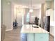 Open concept kitchen with island and a view of the entryway at 124 Cerise Ct, Daytona Beach, FL 32124