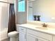 Clean bathroom with a shower/tub combo and vanity at 124 Cerise Ct, Daytona Beach, FL 32124