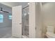Bathroom with shower and toilet at 5102 Caspian St, Saint Cloud, FL 34771