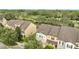 Community overview showcasing townhomes with lush greenery at 5102 Caspian St, Saint Cloud, FL 34771