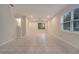 Spacious living room with tile floors and stairs at 5102 Caspian St, Saint Cloud, FL 34771