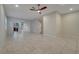 Open living room, kitchen and stairs view at 5102 Caspian St, Saint Cloud, FL 34771