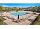 Relaxing resort-style pool with lounge chairs at 5102 Caspian St, Saint Cloud, FL 34771