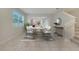Elegant dining area with a spacious table and modern lighting at 5102 Caspian St, Saint Cloud, FL 34771