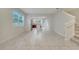 Open living area with kitchen and stairs at 5102 Caspian St, Saint Cloud, FL 34771