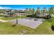 Outdoor basketball court next to playground at 5102 Caspian St, Saint Cloud, FL 34771