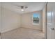 Bright bedroom with carpet, window, and ceiling fan at 5102 Caspian St, Saint Cloud, FL 34771