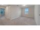 Bright bedroom with carpeted floor and window at 5102 Caspian St, Saint Cloud, FL 34771