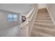 Carpeted staircase leading to the second floor at 5102 Caspian St, Saint Cloud, FL 34771