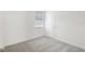 Cozy bedroom with grey carpet and neutral walls at 2727 Virginia Pine Dr, Bartow, FL 33830