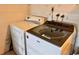 Convenient laundry room with washer and dryer included at 5135 Warrior Ln, Kissimmee, FL 34746