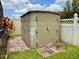 Exterior storage shed provides extra space for lawn equipment at 5135 Warrior Ln, Kissimmee, FL 34746