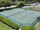 Community tennis courts with surrounding landscaping at 5135 Warrior Ln, Kissimmee, FL 34746