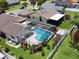 Aerial view showcasing home, pool, and backyard at 5135 Warrior Ln, Kissimmee, FL 34746