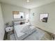 Bright bedroom with a comfortable bed and stylish decor at 14954 Sw 38Th Cir, Ocala, FL 34473
