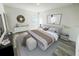Elegant bedroom with a king-size bed and contemporary furnishings at 14954 Sw 38Th Cir, Ocala, FL 34473