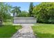 Detached storage shed with concrete driveway at 1803 E Kaley Ave, Orlando, FL 32806